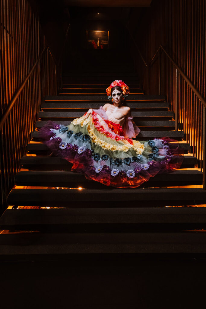 iLaCatrina, LLC is a company founded and led by Araminta Romero, originally from Veracruz and currently based in San Antonio, Texas. With over 20 years of study on Mexican history and the roots of Día de Muertos, Araminta has established herself as a cultural ambassador dedicated to preserving and sharing our traditions. Her work has been recognized for its authenticity and symbolic depth by UNAM San Antonio, the University of Texas at San Antonio (UTSA), and the Consulate of Mexico.