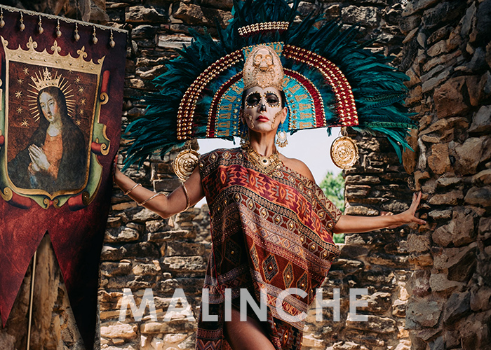 Catrina Malinche pays homage to this controversial and complex woman—holding the banner Cortés used in 1521 to declare New Spain, wearing a replica of Moctezuma’s headpiece displayed in the Museum of Vienna, and crowned with an artist-inspired interpretation of the regal crown seen in historical illustrations.